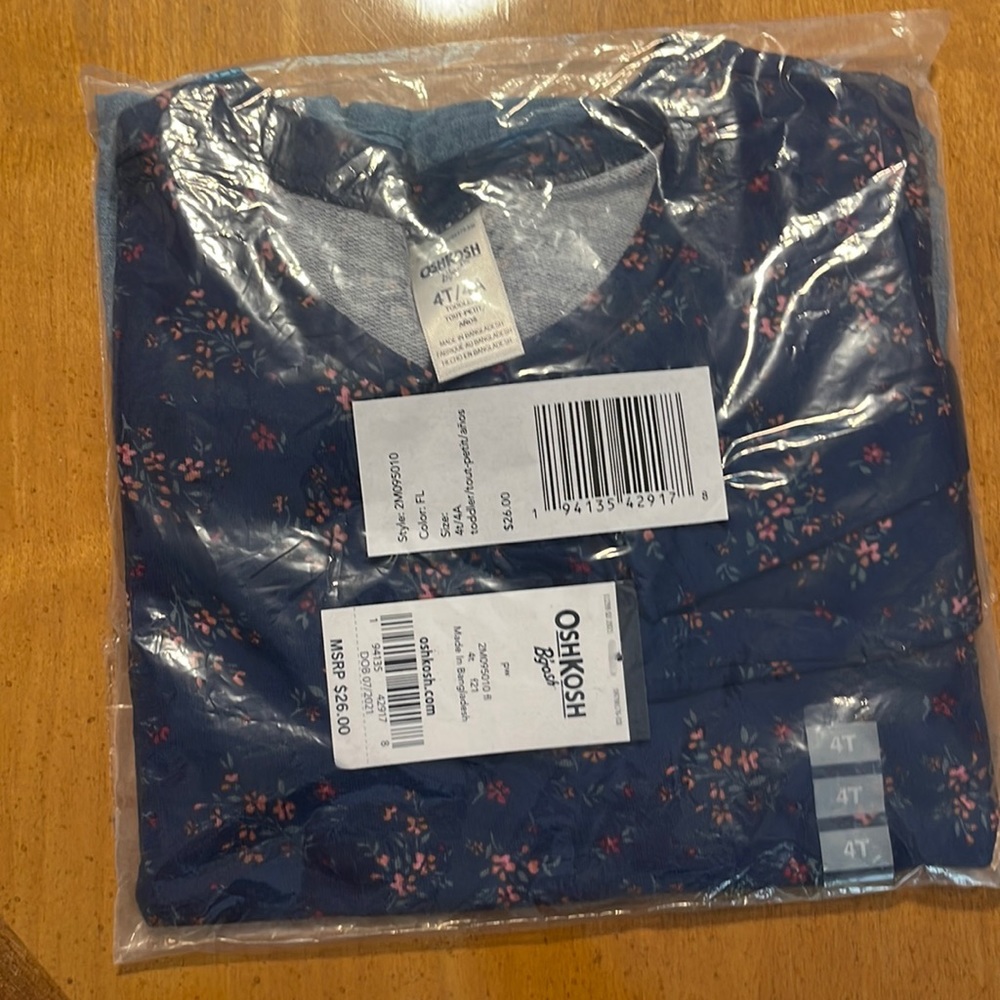 NWT size 4t Oshkosh shirt with denim ruffle at bottom
